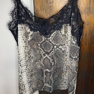 Super cute and flown ZARA cheetah tank top. SIZE SMALL